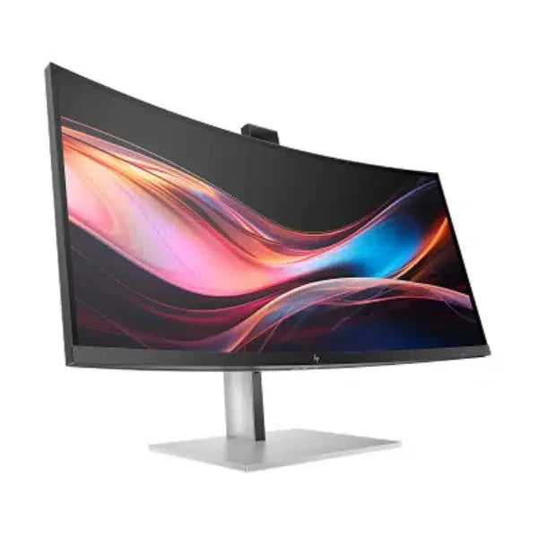 Curved widescreen computer monitor with colorful display on a sleek silver stand