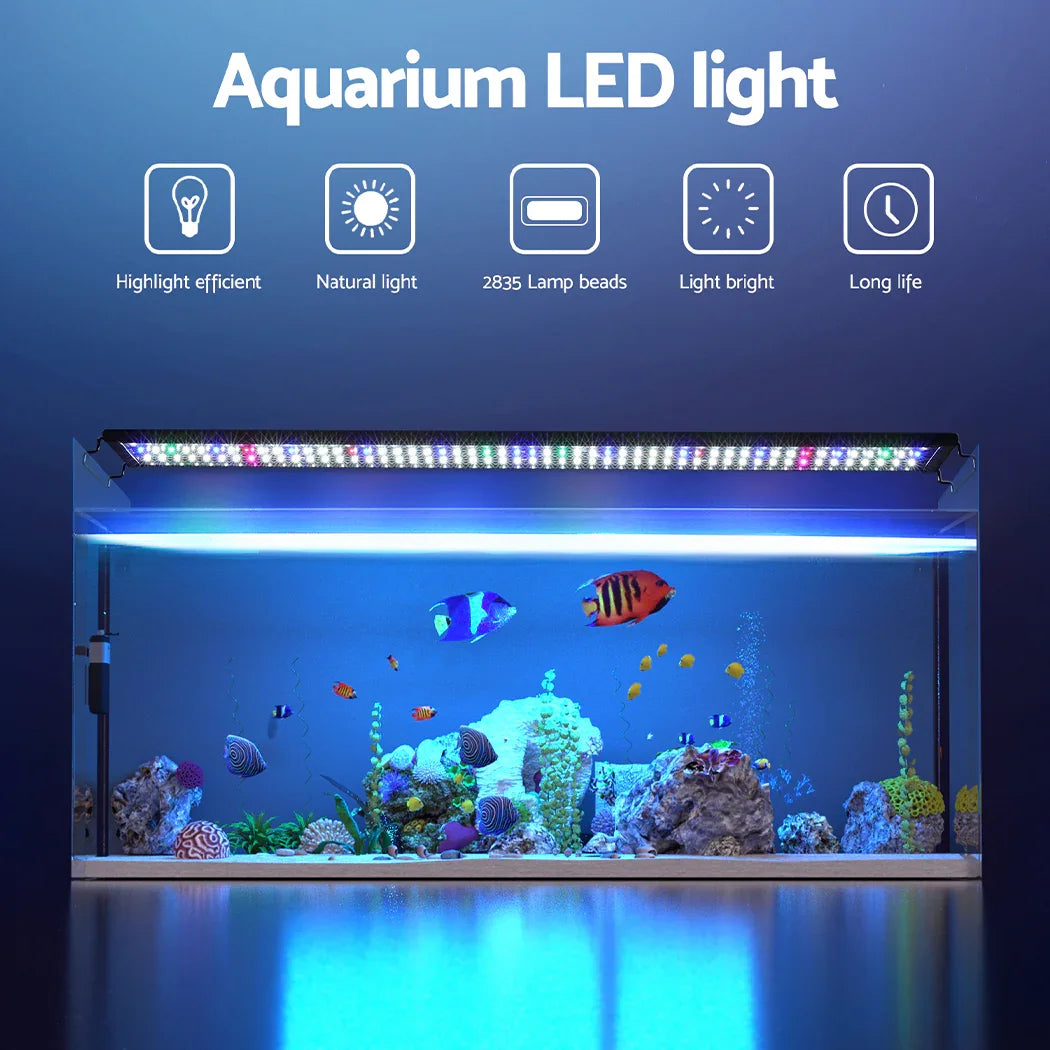 Aquarium LED light illuminating a fish tank with vibrant fish and aquatic plants