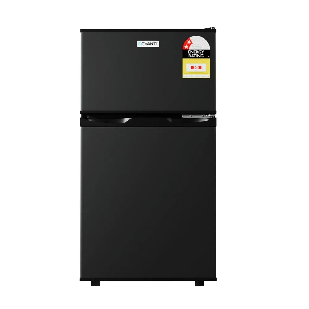 Black two-door bar fridge freezer with energy rating sticker, modern compact design