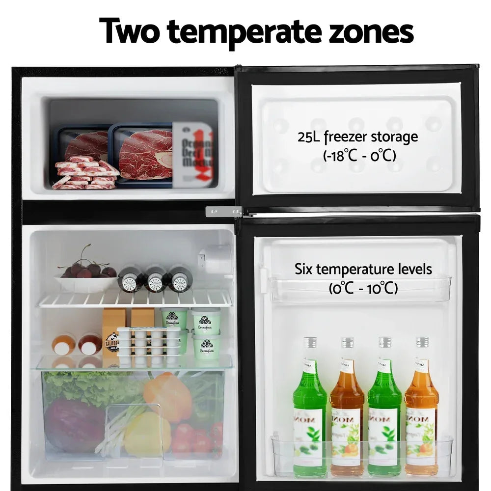 Double door fridge with freezer and fridge zones, food, drinks, and fresh produce inside.