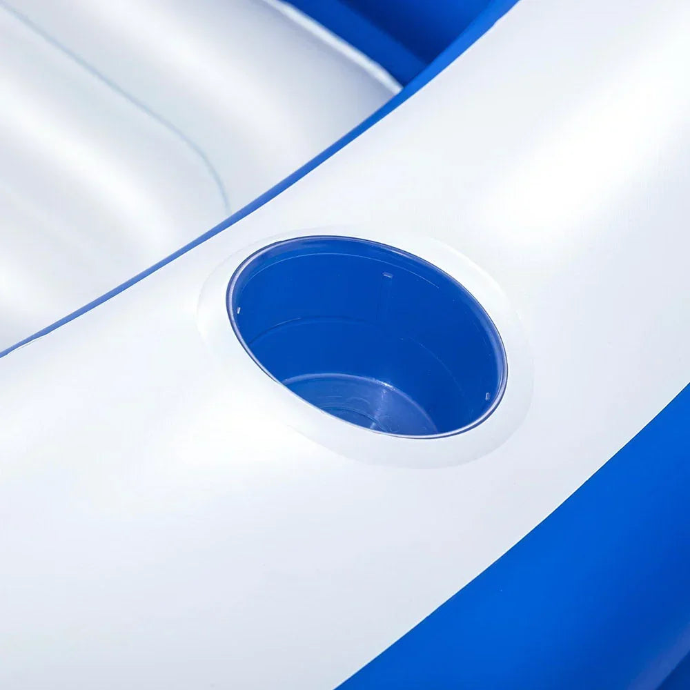 Close-up of blue and white inflatable pool with built-in cup holder