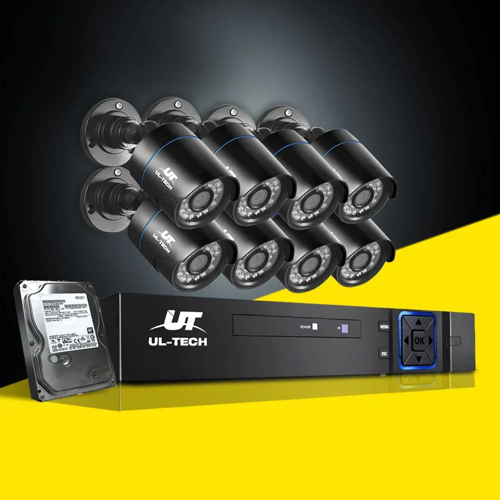 Eight black CCTV security cameras with DVR recorder and hard drive on a black and yellow background