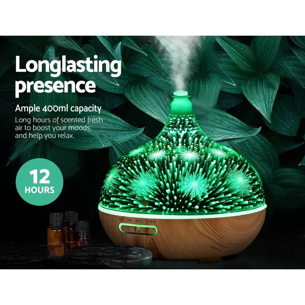 Colorful LED essential oil diffuser with 400ml capacity emitting mist, surrounded by greenery.