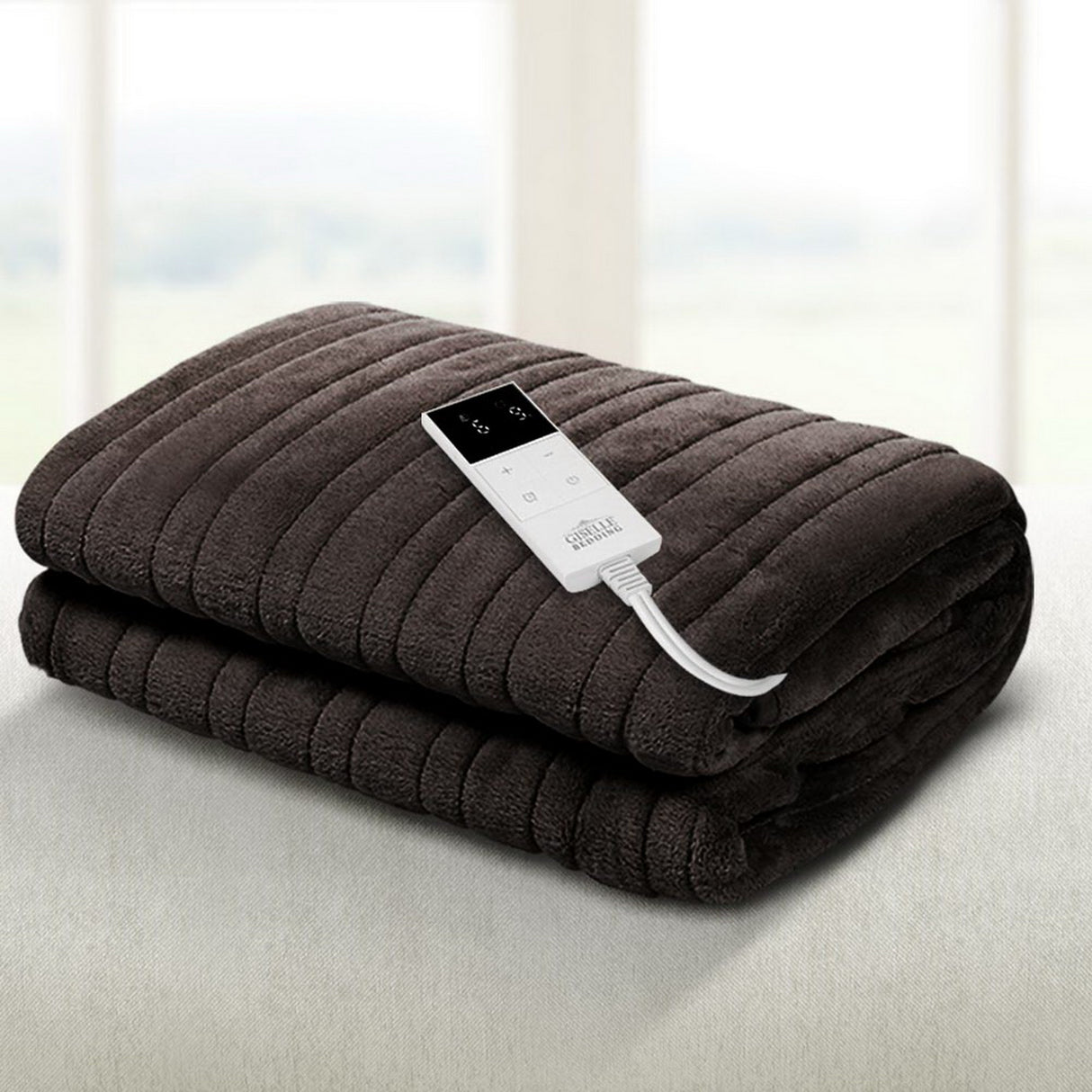 Dark grey electric heated blanket with digital controller on a light surface