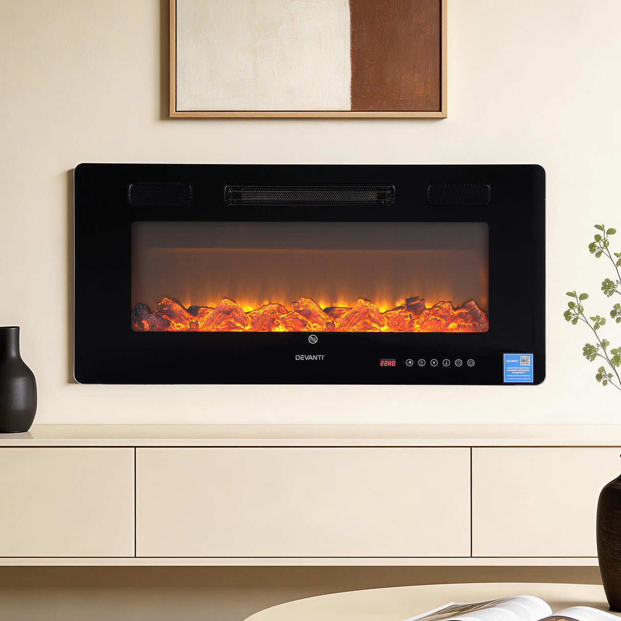 Modern black wall-mounted electric fireplace with realistic LED flame and glowing crystals in a stylish living room.