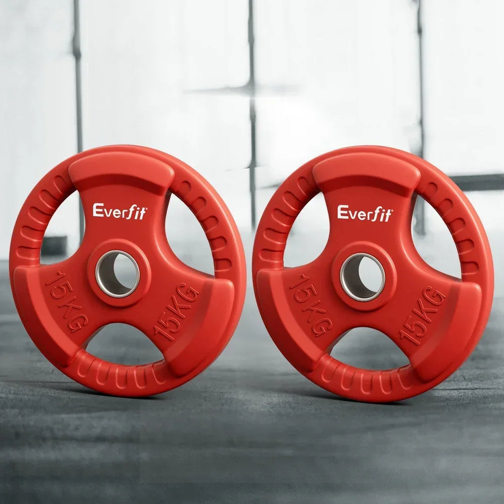 Pair of red Everfit 15KG weight plates with grip handles on gym floor