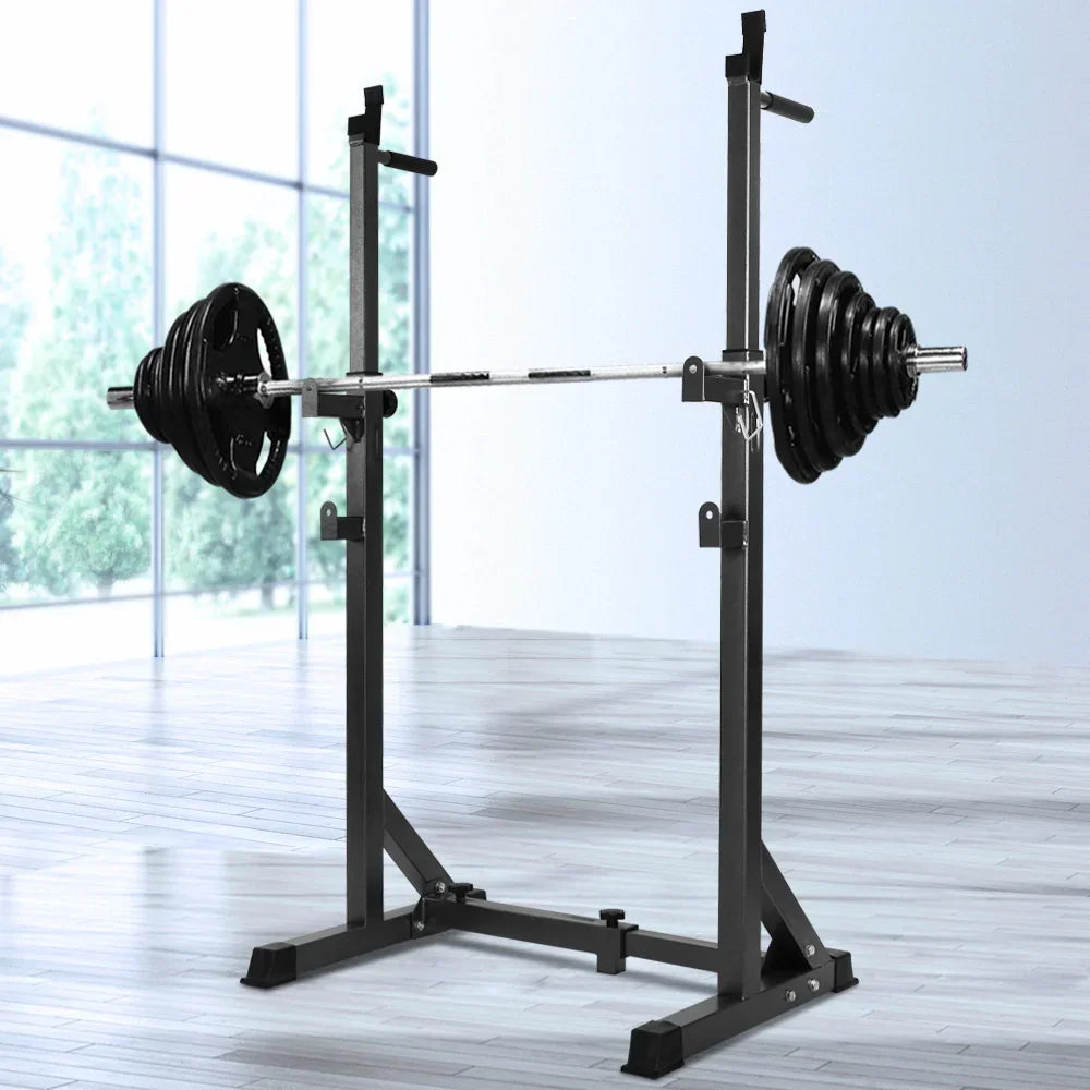 Adjustable squat rack with loaded barbell and weight plates in modern home gym