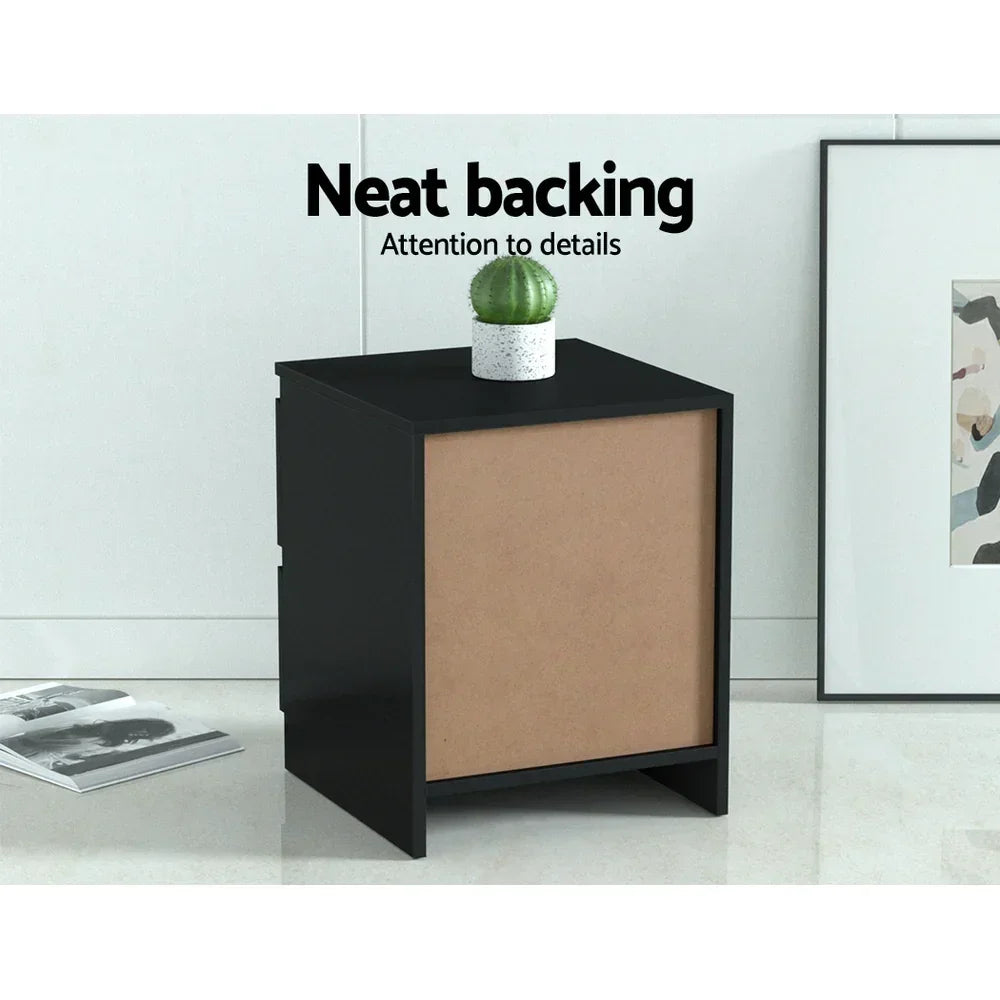 Black bedside table with neat backing, small potted plant on top, modern home decor