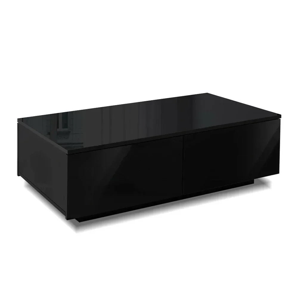 Modern black rectangular coffee table with glossy finish and storage drawers on white background