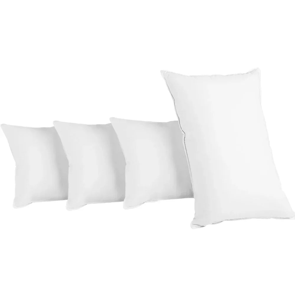 Set of four white pillows including three square and one rectangular pillow on white background