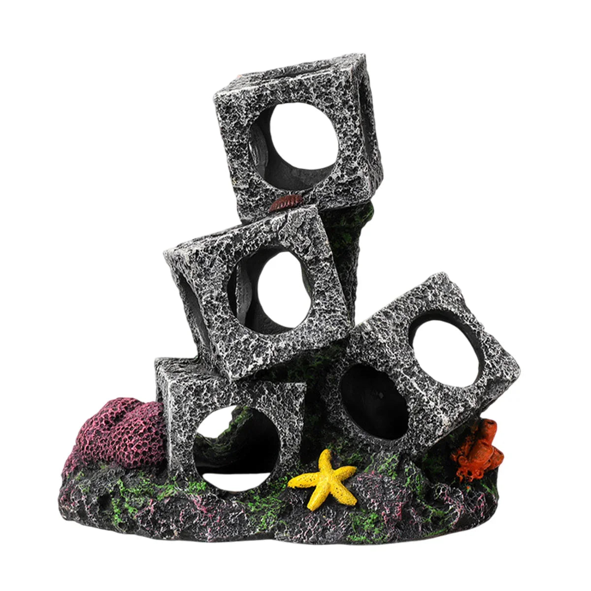 Aquarium decor with stacked stone cubes, coral, starfish, and colorful marine details