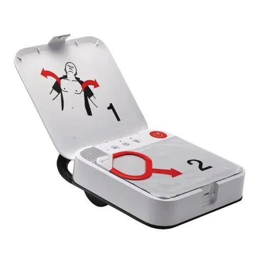 Automated external defibrillator AED device open with illustrated usage instructions visible