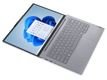Silver Lenovo laptop with Windows 11 interface, sleek design, ideal for work or study