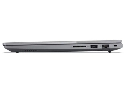 Silver laptop side view showing ports and ventilation slots for connectivity and cooling