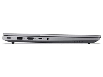 Silver laptop side view showing USB, HDMI, and audio ports for connectivity and charging