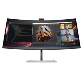 Ultra-wide curved computer monitor displaying code, 3D graphics, and video conference