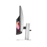 Side view of a curved computer monitor with slim bezel and silver stand on white background