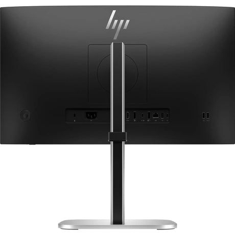 Back view of a black HP computer monitor on a silver stand showing multiple ports