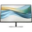 Ultra-slim computer monitor with minimal bezels on a silver stand, displaying abstract waves
