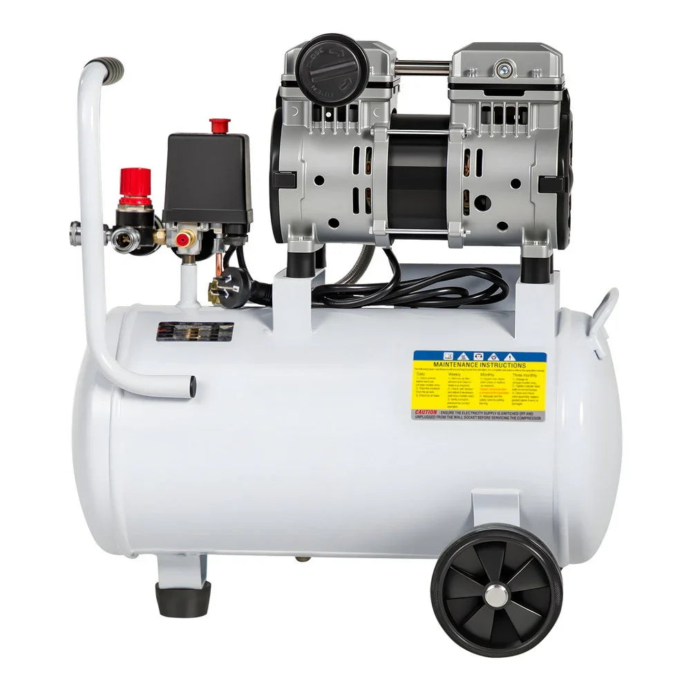 White portable air compressor with dual cylinder motor and control valves on wheels