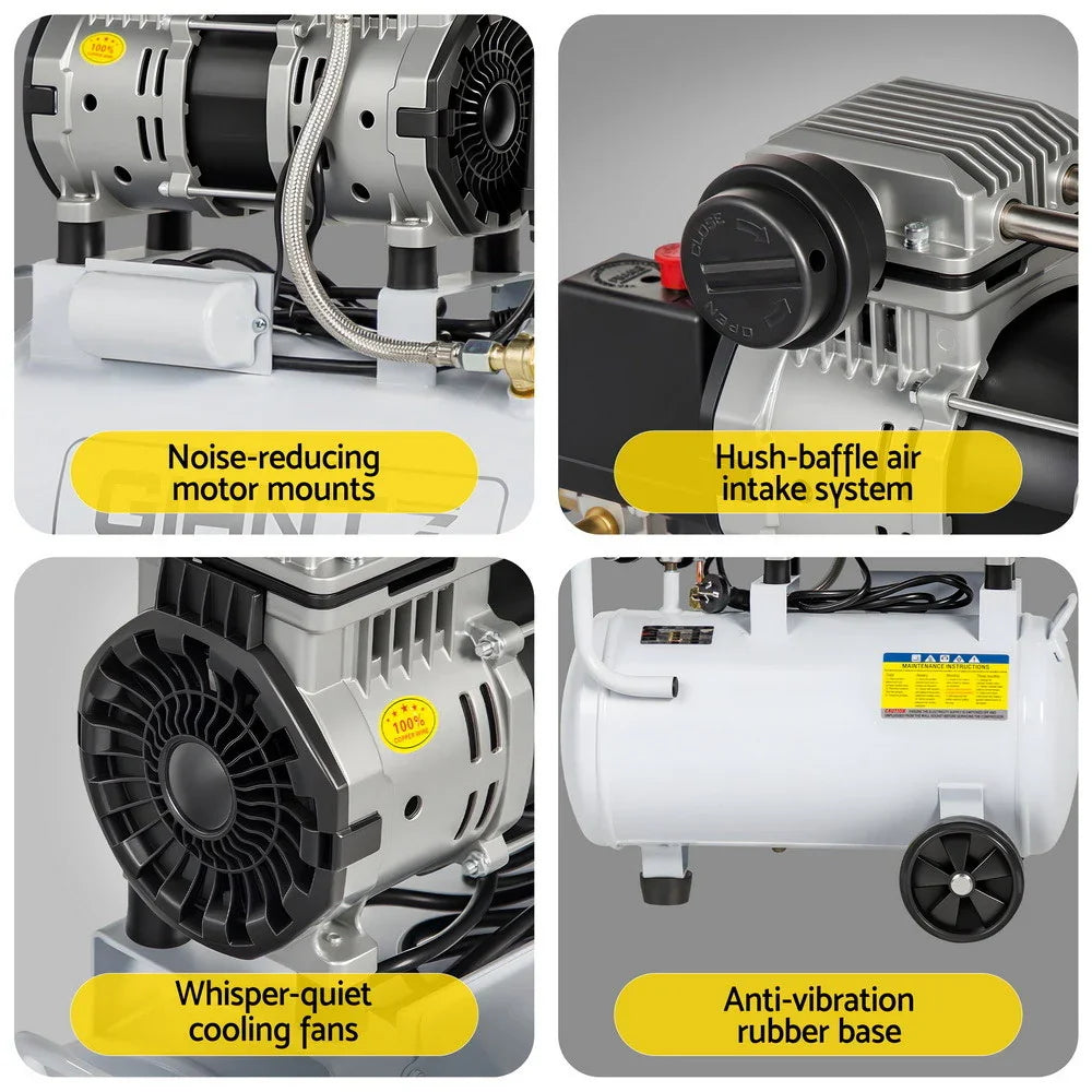 Close-up of a white air compressor with noise-reducing motor mounts, hush-baffle air intake, whisper-quiet cooling fans, and anti-vibration rubber base.