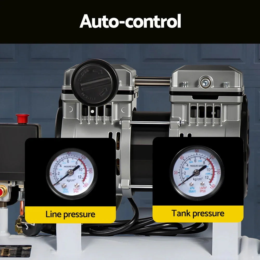 Close-up of air compressor gauges showing line pressure and tank pressure, auto-control feature.