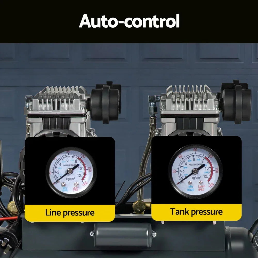 Close-up of air compressor gauges displaying line pressure and tank pressure settings.