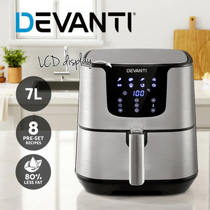 Stainless steel digital air fryer with LCD display, 7L capacity, preset programs, in kitchen setting.