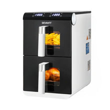 Dual drawer digital air fryer oven with fries and chicken visible inside compartments