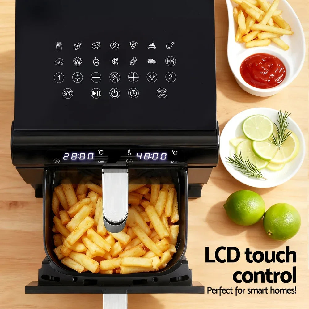 Digital air fryer with LCD touch control, loaded with fries, next to sauce, lime, and lemon slices.