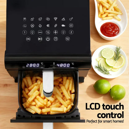 Digital air fryer with LCD touch control, loaded with fries, next to sauce, lime, and lemon slices.