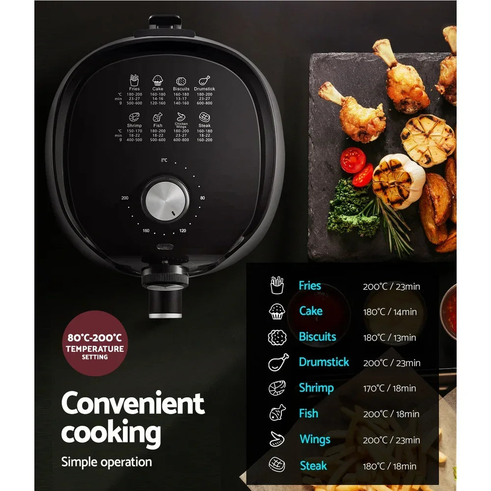 Air fryer with temperature settings, assorted cooked foods on slate plate, guide for cooking fries, cake, biscuits, drumsticks, shrimp, fish, wings, steak.