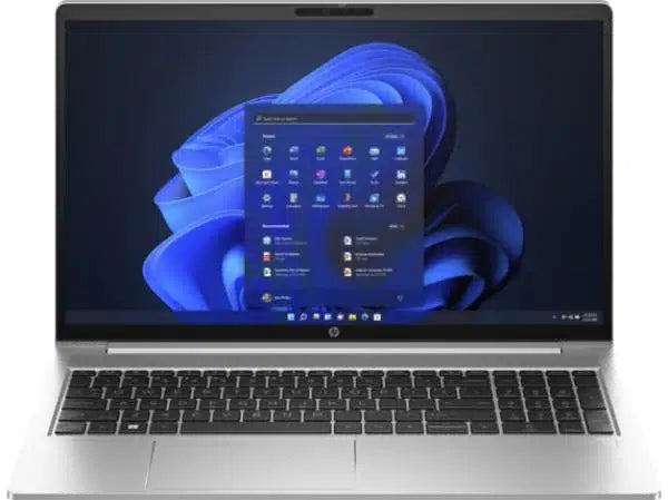 Silver HP laptop with Windows 11 home screen displayed on the monitor