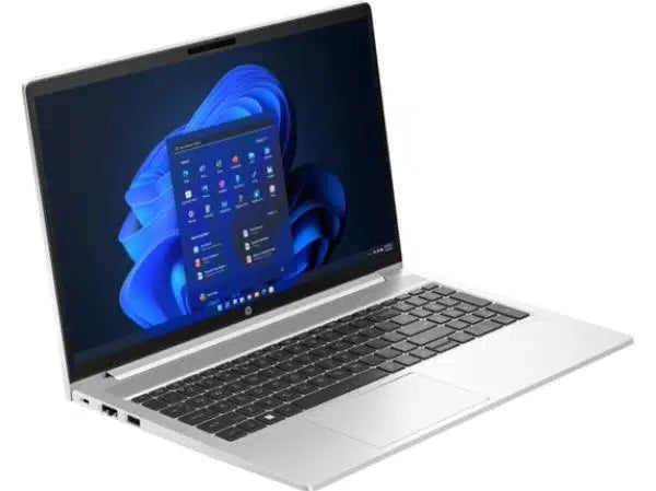 Silver laptop with Windows 11 home screen, black keyboard, and open display on white background