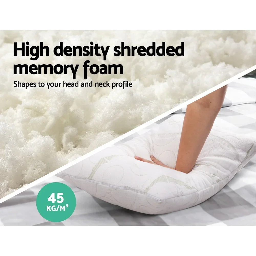 Hand pressing white shredded memory foam pillow, showing 45 kg/m³ high density support.