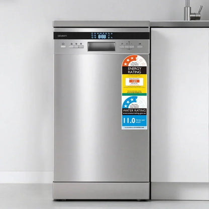 Stainless steel freestanding dishwasher with energy and water rating labels in modern kitchen.