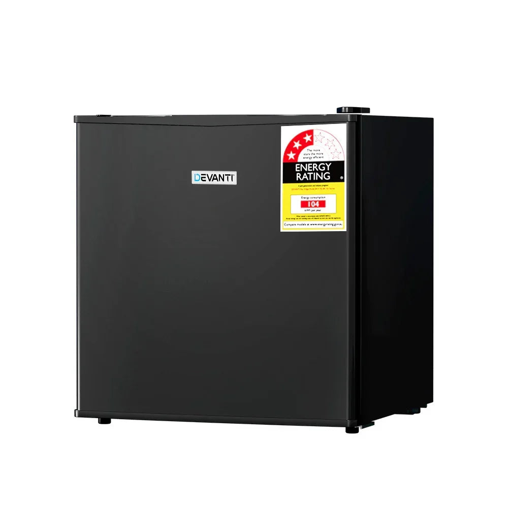 Black compact bar fridge with energy rating sticker on front, single door, modern design