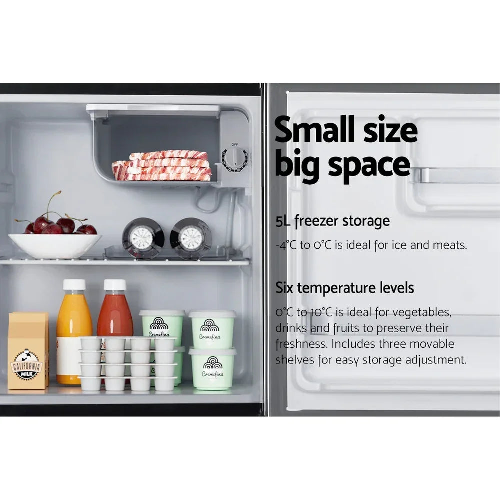 Compact fridge interior with organized food, adjustable shelves, 5L freezer, and six temperature settings