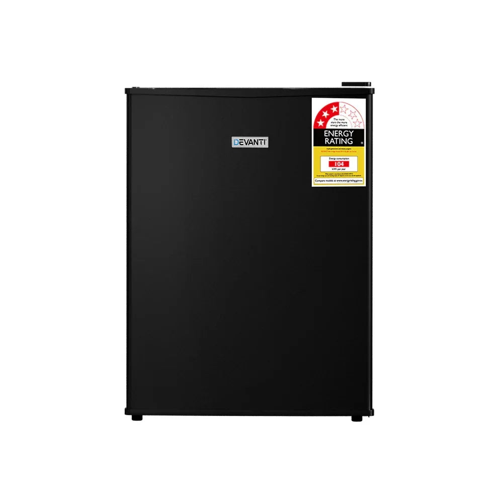 Black mini bar fridge with energy rating label on the door, compact and freestanding design.