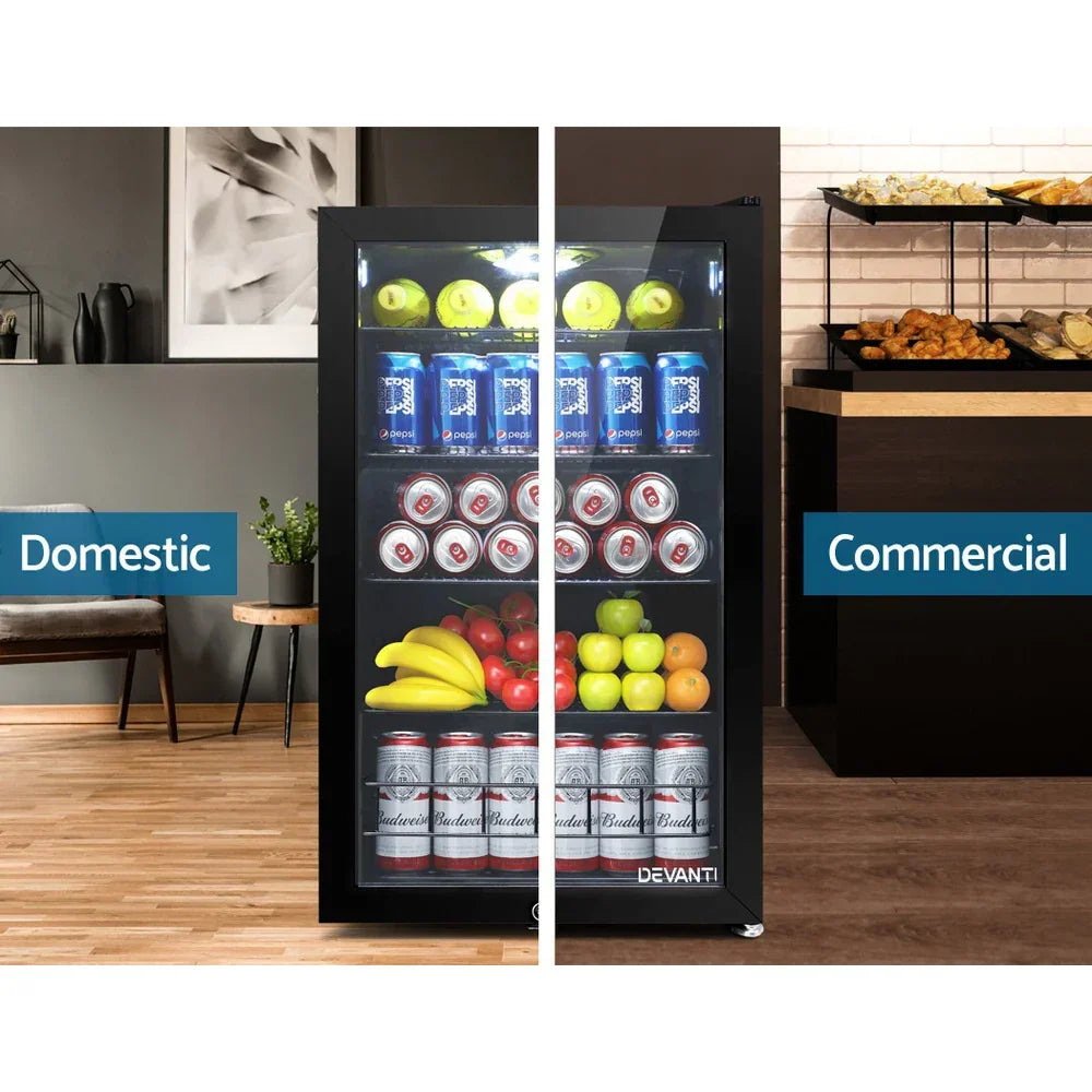 Glass door bar fridge stocked with drinks and fruit, suitable for domestic or commercial use