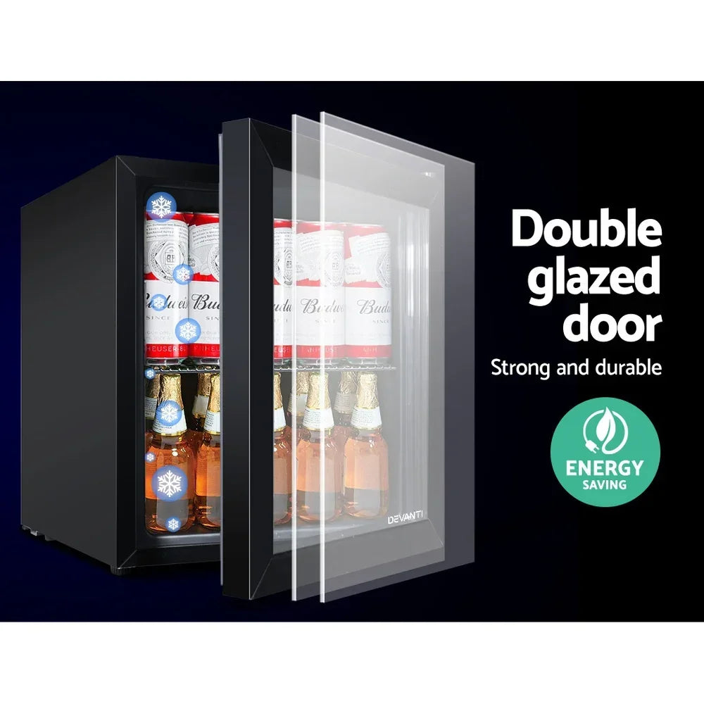 Energy saving bar fridge with double glazed glass door displaying drinks inside.