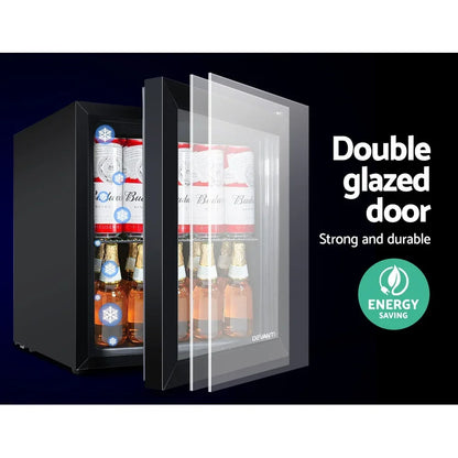 Energy saving bar fridge with double glazed glass door displaying drinks inside.