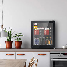 Kitchen scene with small glass door bar fridge filled with assorted drinks on a countertop