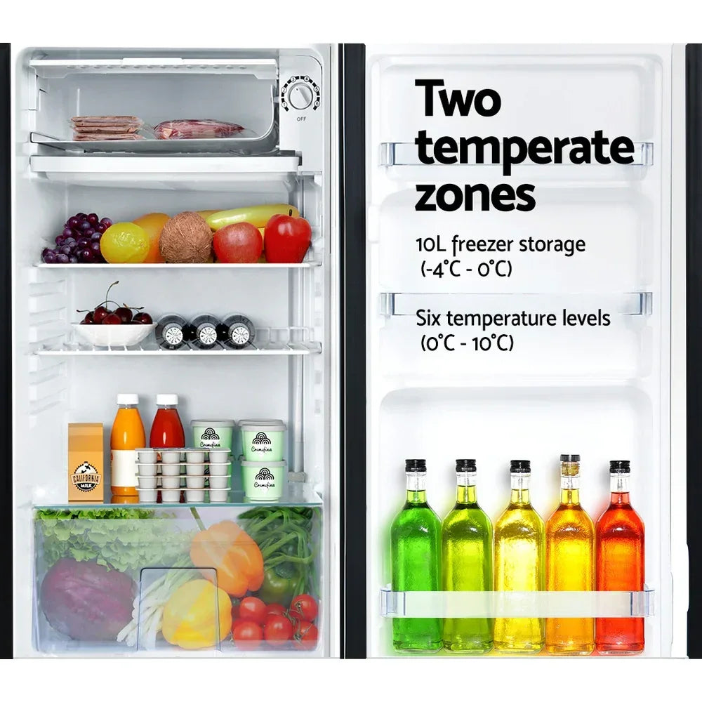 Open refrigerator with various groceries, drinks, fresh produce and adjustable temperature zones