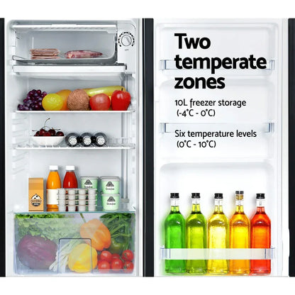 Open refrigerator with various groceries, drinks, fresh produce and adjustable temperature zones
