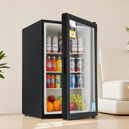 Black bar fridge with glass door displaying drinks and fruit in a modern living room setting