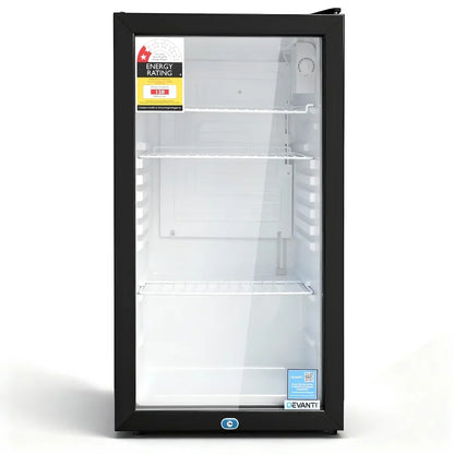 Black glass door mini bar fridge with three wire shelves and energy rating label