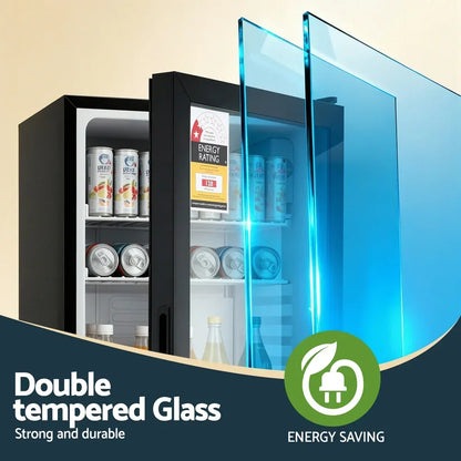 Double tempered glass mini fridge with drinks, energy rating label, and energy saving icon