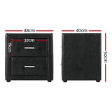 Black two-drawer bedside table with dimensions labeled, modern faux leather finish.