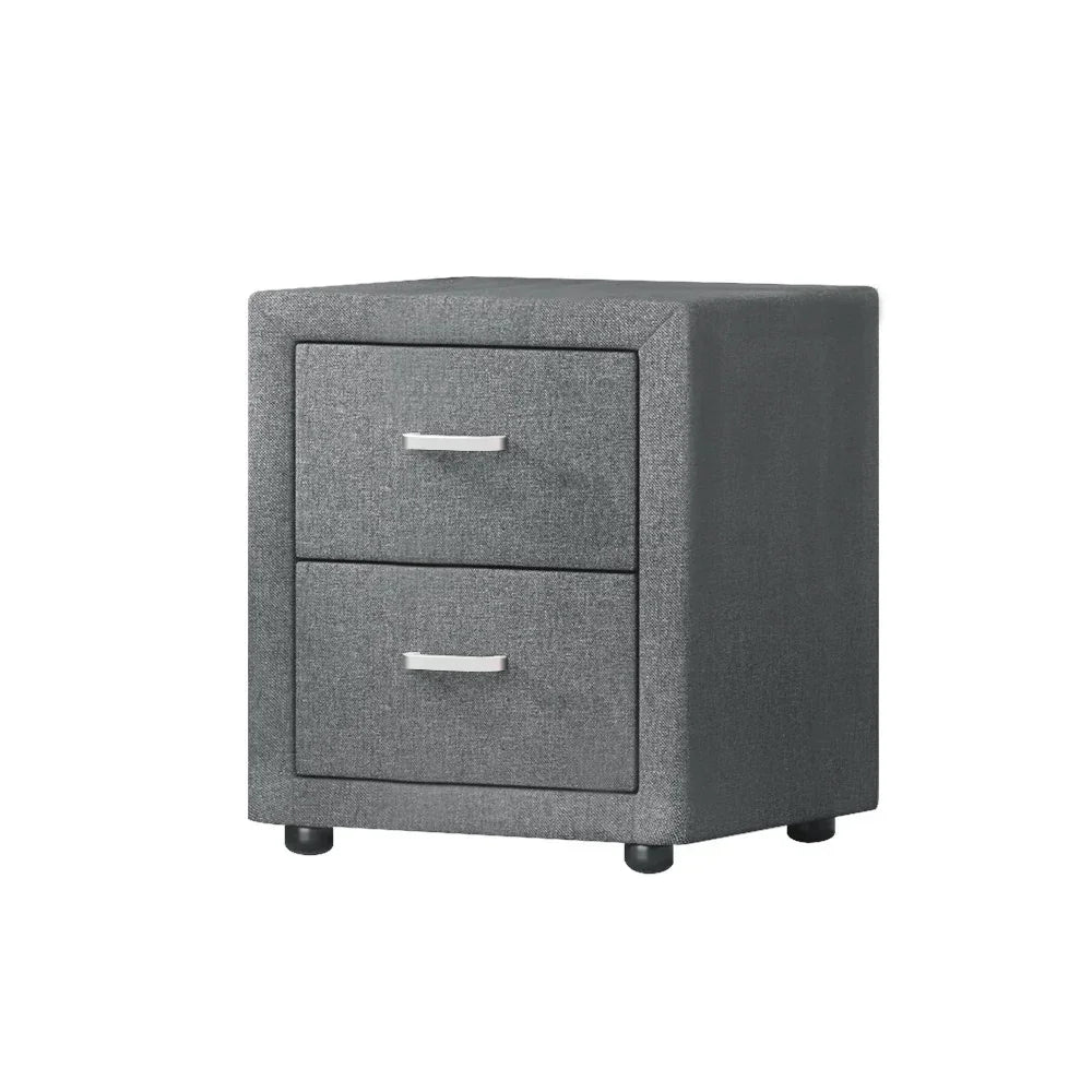 Modern grey two-drawer bedside table with fabric upholstery and metal handles